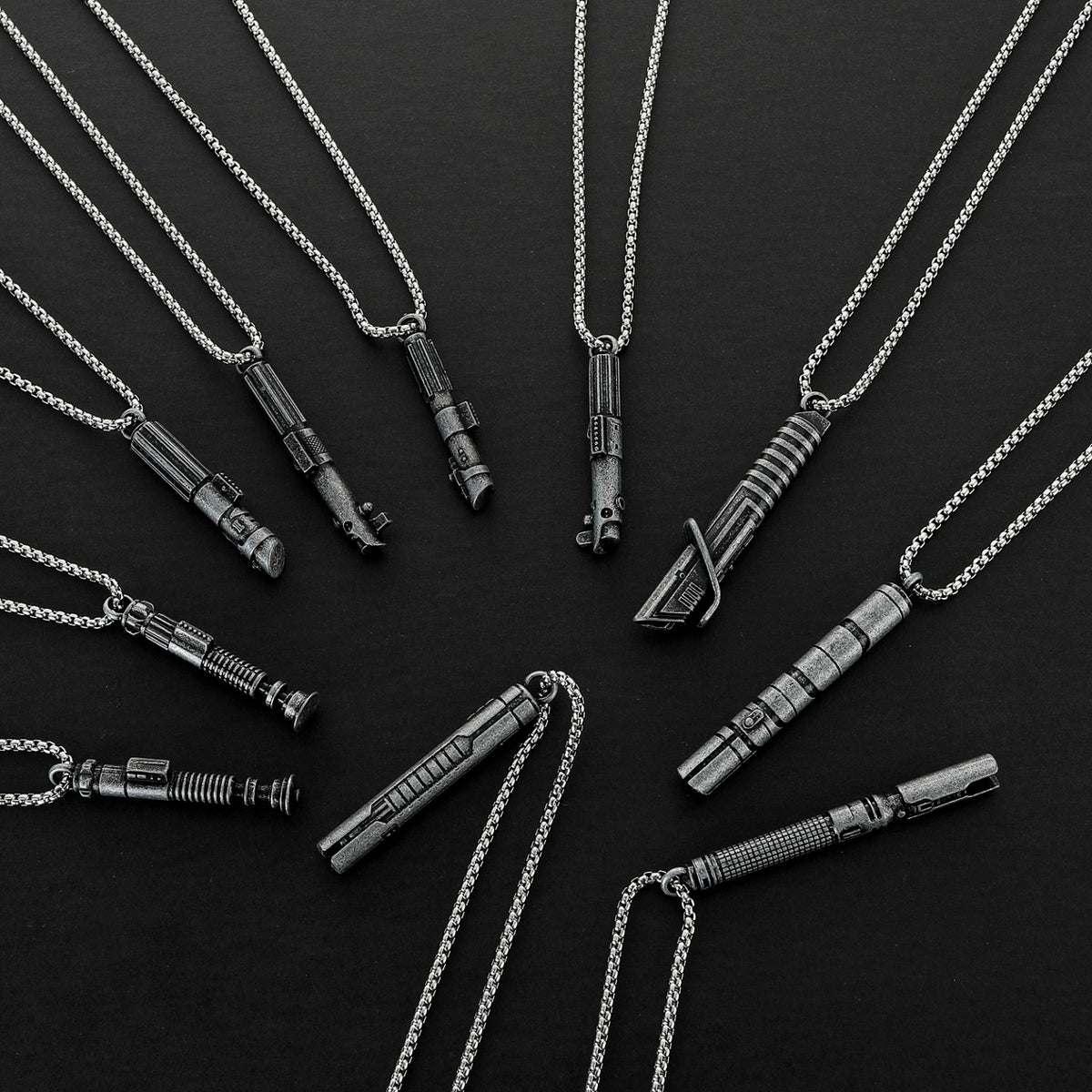 Saber X saber necklaces showing all 10 available hilt designs, sold individually