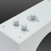 Close-up of the adjustment controls on top of the white levitating saber stand