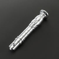 Silver saber hilt on grey background