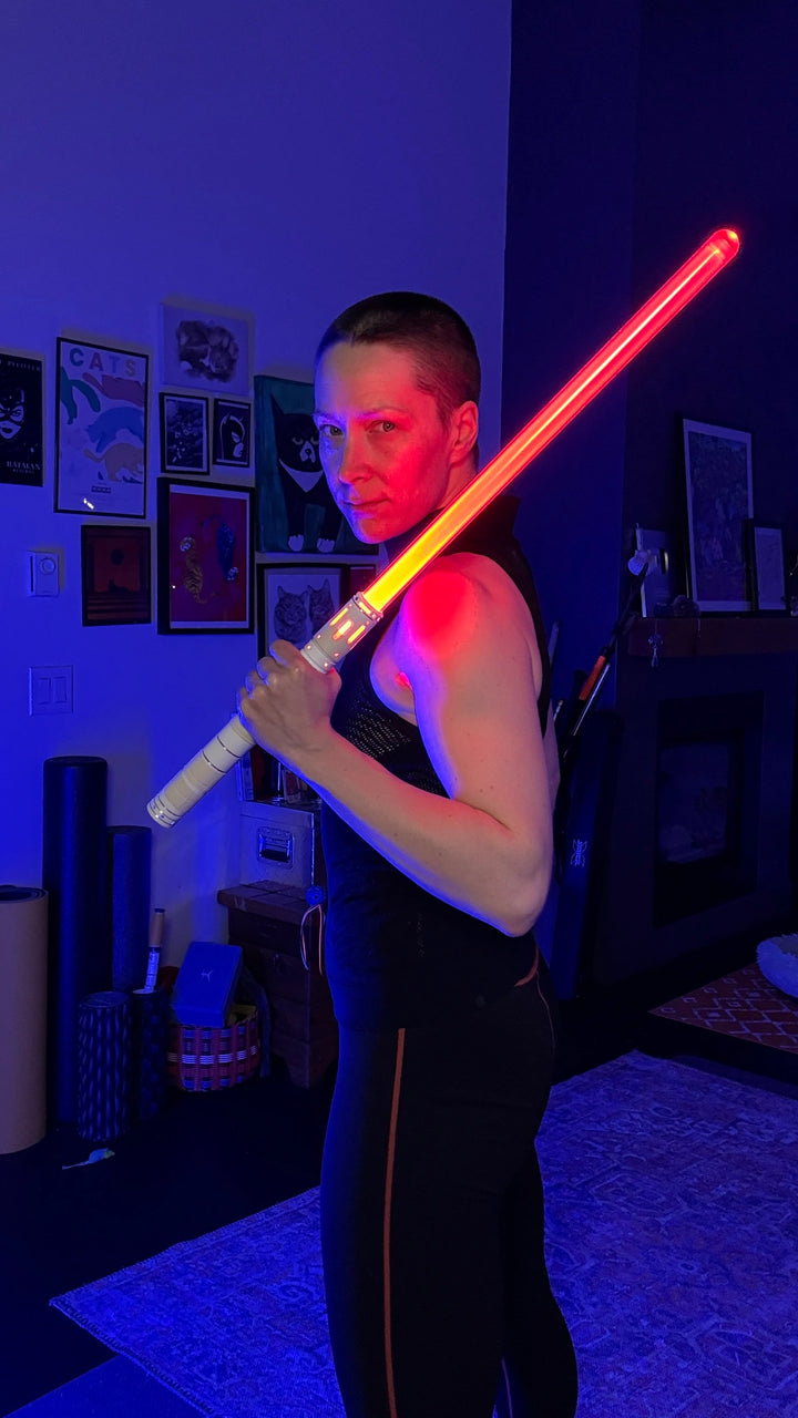 Michelle C. Smith demonstrating a single saber spin