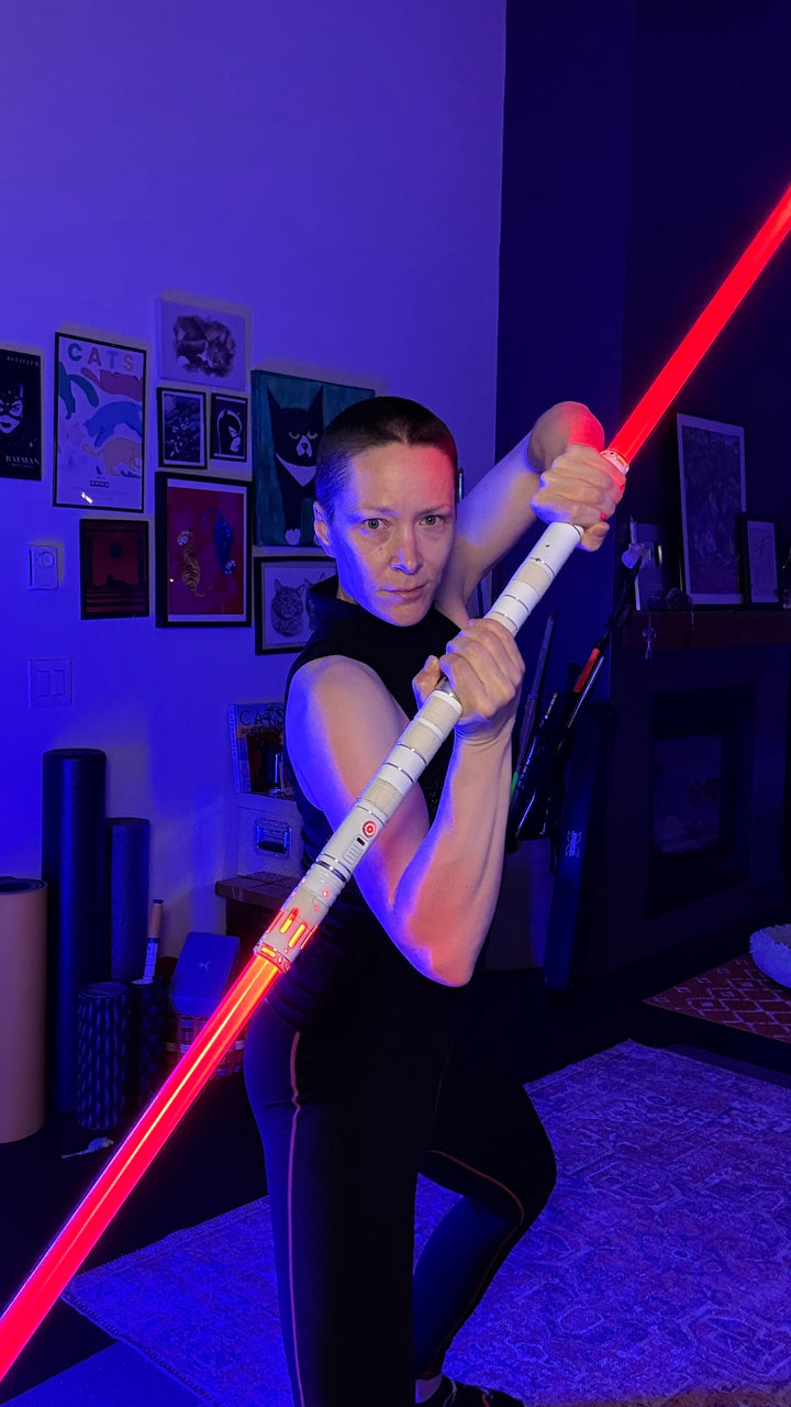 Michelle C. Smith demonstrating saber staff movement